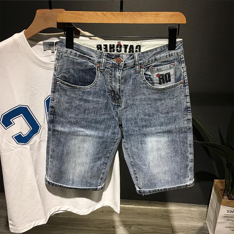 Pantaloncini di jeans da uomo, estivi sottili larghi dritti casual alla moda marca strappati cinque o sei divisione del lavoro pantaloni da uomo