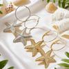 European and American women's earrings, personalized vacation style starfish pendant design earrings, versatile niche earrings