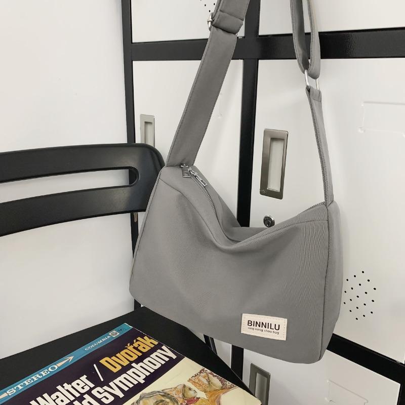 Trendy fashion letter simple sports canvas solid color shoulder bag retro student messenger bag bag