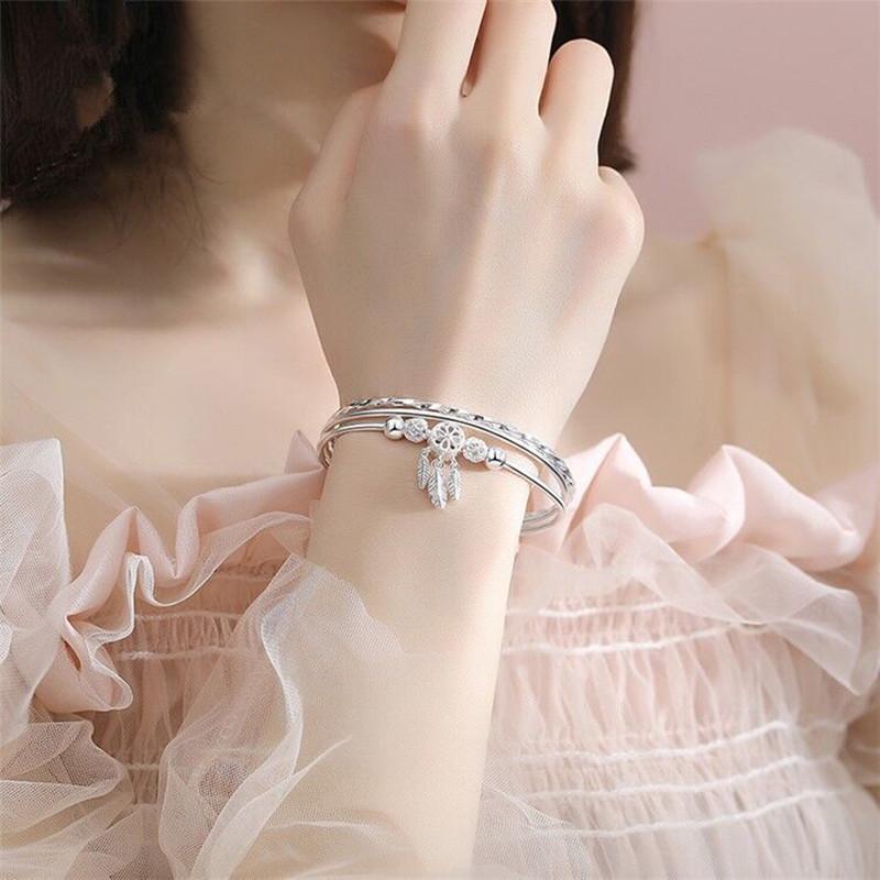 Douyin Weißkupfer-Versilbert Traumfänger Armband: Retro Drei-Ring Hohlfeder Design für Damen