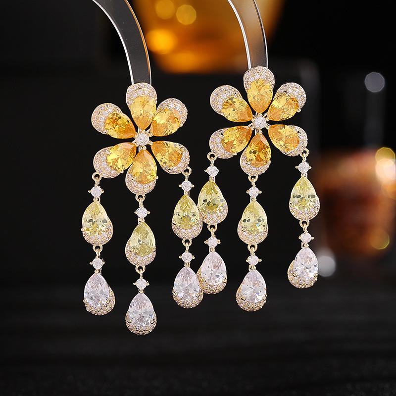 

Женские серьги элегантного дизайна «легкая роскошь» в виде подсолнуха и капли воды, модные и универсальные, нишевый дизайн, серьги с кисточками