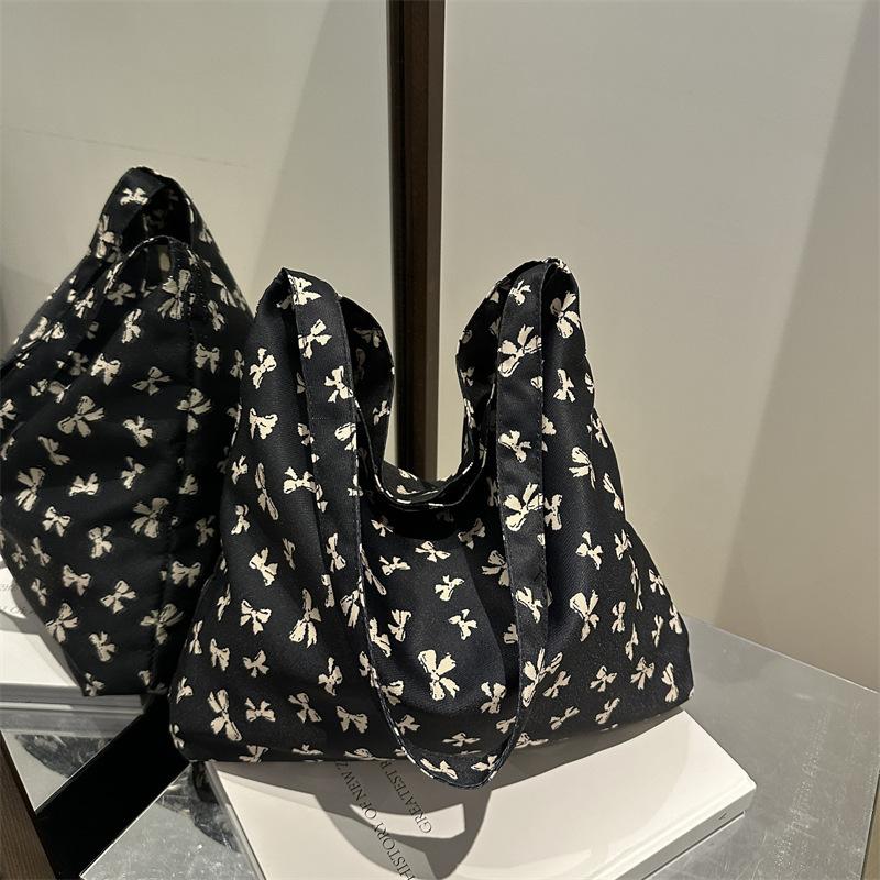 Design Sense Niche Canvas Bag Women's 2025 New Large-capacity Korean Leopard Print Floral Shoulder Student Printed Women's Bag