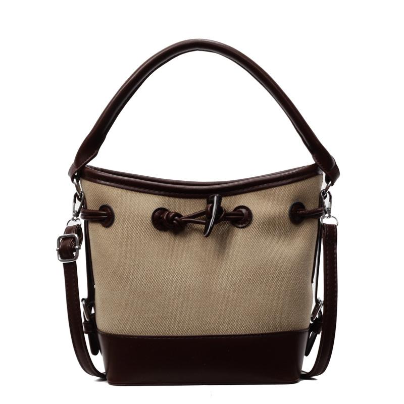 Niche design canvas splicing contrasting color bucket bag women's new portable commuter bag shoulder messenger bag
