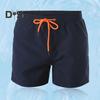 Letnie, średni stan, elastyczny pas ze sznurkiem, plażowe spodenki surfingowe, siateczkowa podszewka, kieszenie, szybkoschnące pływaki