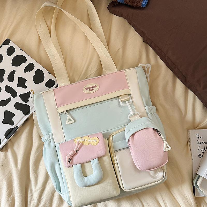 New Japanese ins fresh and sweet contrasting colors splicing bar pain bag girl junior high school students large-capacity backpack