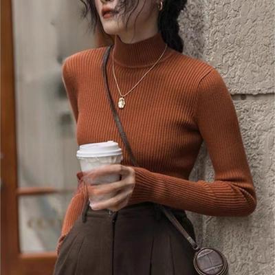 Questo è un maglione da donna nuovo, elegante e versatile per l'autunno e l'inverno con un collo semi-alto.. È un top a maniche lunghe