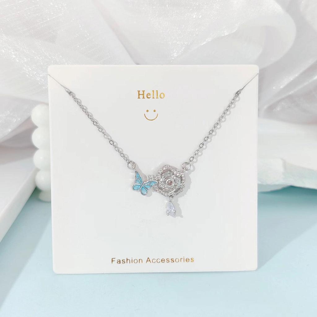 Pink Zircon Gourd Pendant Necklace with Floral Tassels - Titanium Steel Clavicle Chain for Women's Light Luxury.