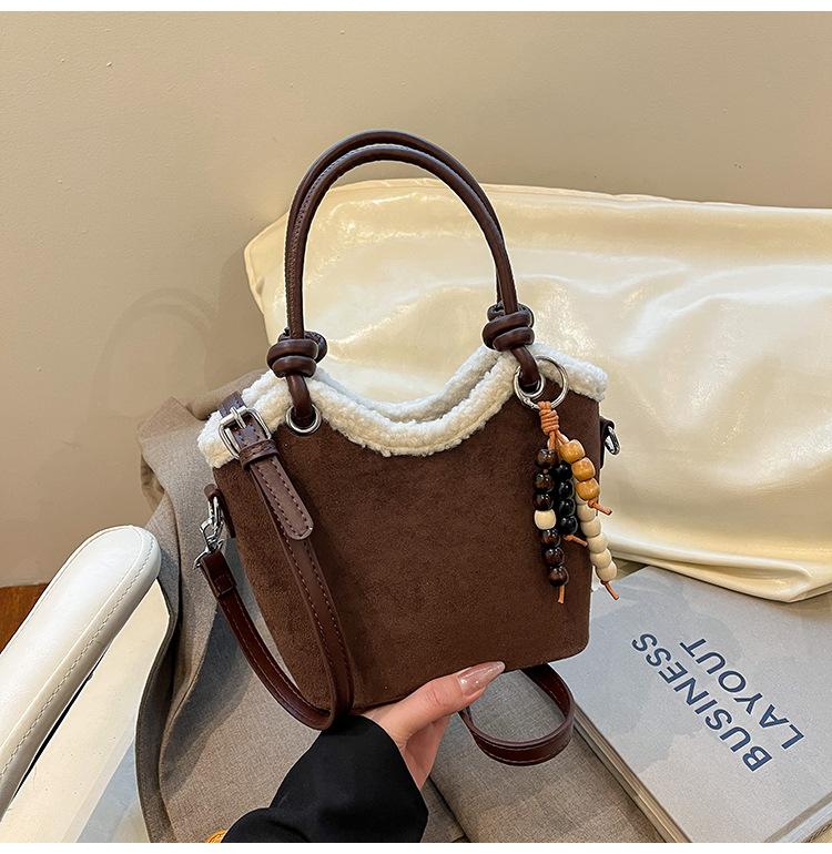 

Niche leopard print bucket bag women s 2025 new versatile messenger bag fashionable retro portable small bag wholesale