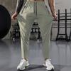 Herren Freizeit-Sporthose, Hochdehnbare Webware, Einfarbig, Normale Passform mit Kordelzugbund und Reißverschluss