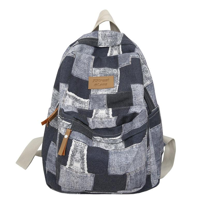 Large-capacity new middle school schoolbag, junior high school backpack, boys' casual versatile college student computer bag, women