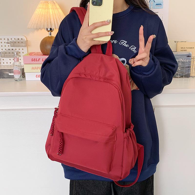 Schoolbag Korean version student schoolbag simple and fashionable large-capacity backpack high value small fresh campus backpack wholesale