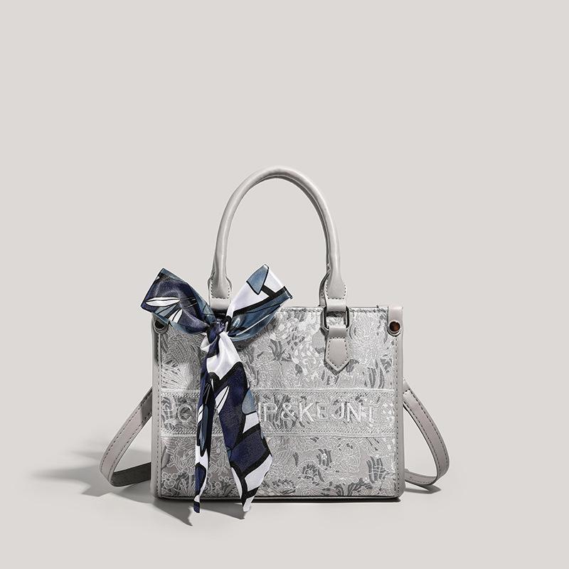 

Premium texture light luxury embroidery versatile portable messenger bag светло-фиолетовый