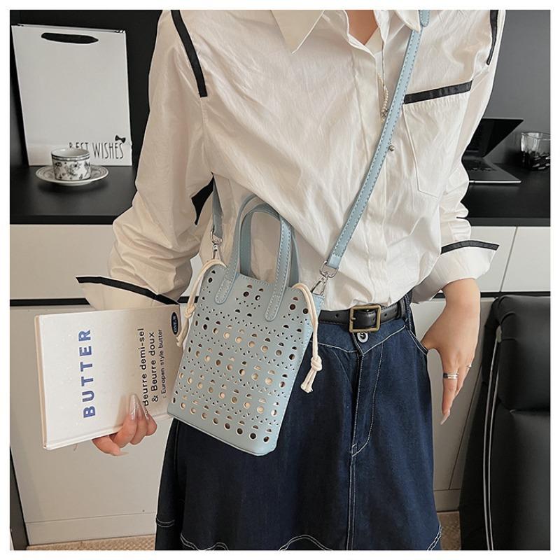 Niche bag women's new summer fashion hollow messenger mother bag portable mobile phone bag