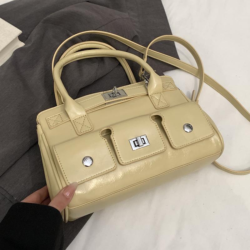 

This year s popular niche high-end locomotive style portable briefcase temperament versatile casual commuter messenger bag woman