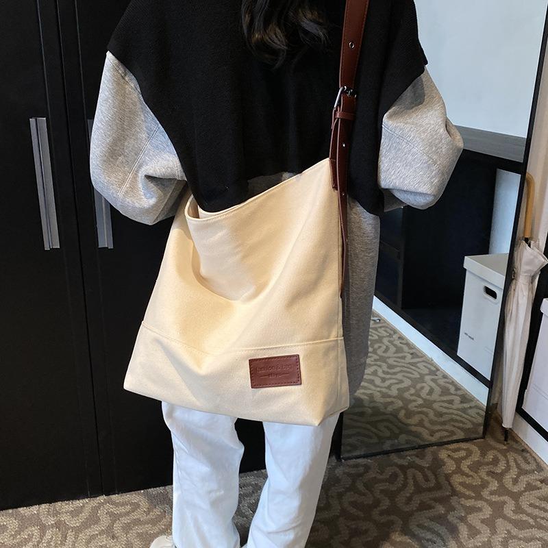 Casual large-capacity canvas bag women's new spring and summer shoulder messenger bag college student tote bag