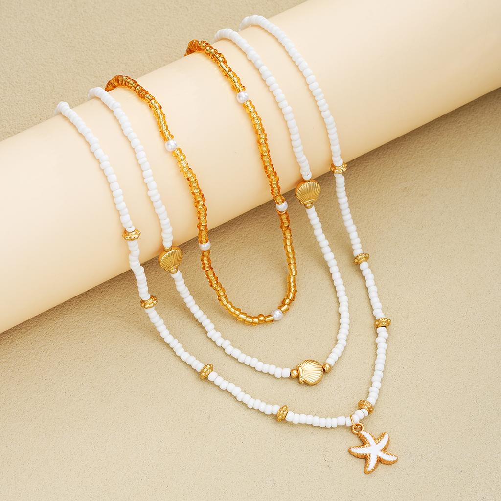 iF ME Set da 6 Pezzi Collana con Ciondoli Stella Marina e Conchiglia Perline di Riso Braccialetti Bohemian Elegante Set di Gioielli Colore Oro Bianco Accessori per le Feste