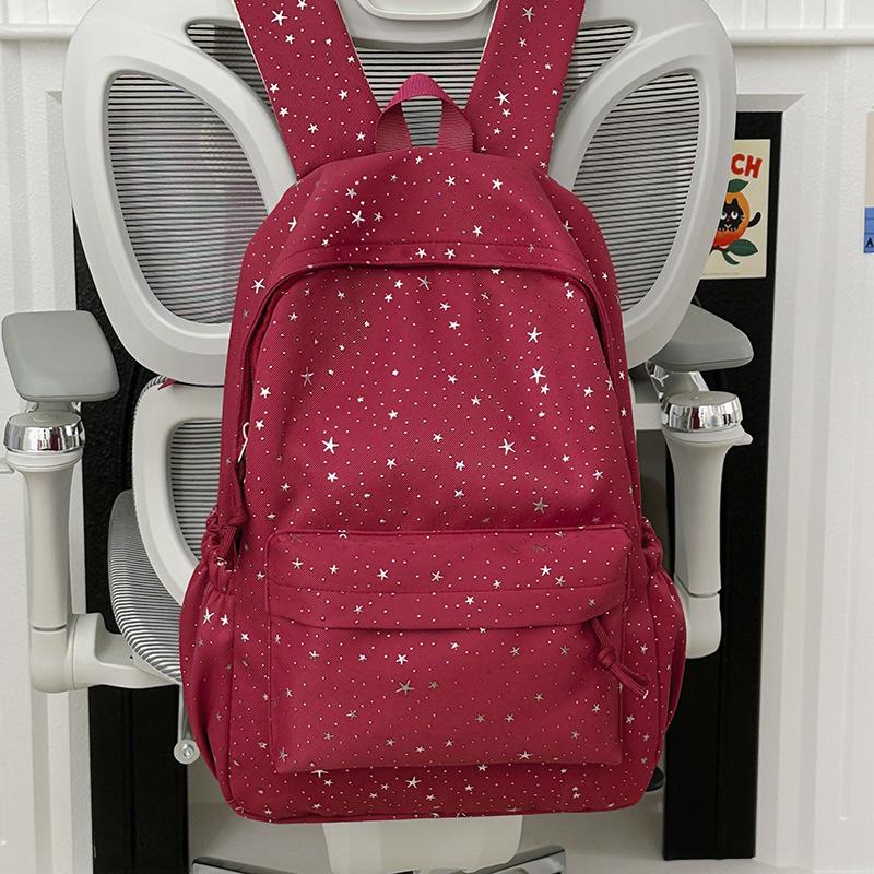 Schoolbag schoolbag new 1011 hot stamping three-dimensional star printing high school students large capacity fresh and sweet casual backpack