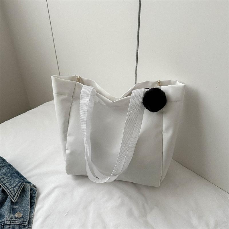 Bag women's new solid color large-capacity canvas shoulder bag simple commuter student tote bag shopping bag tide