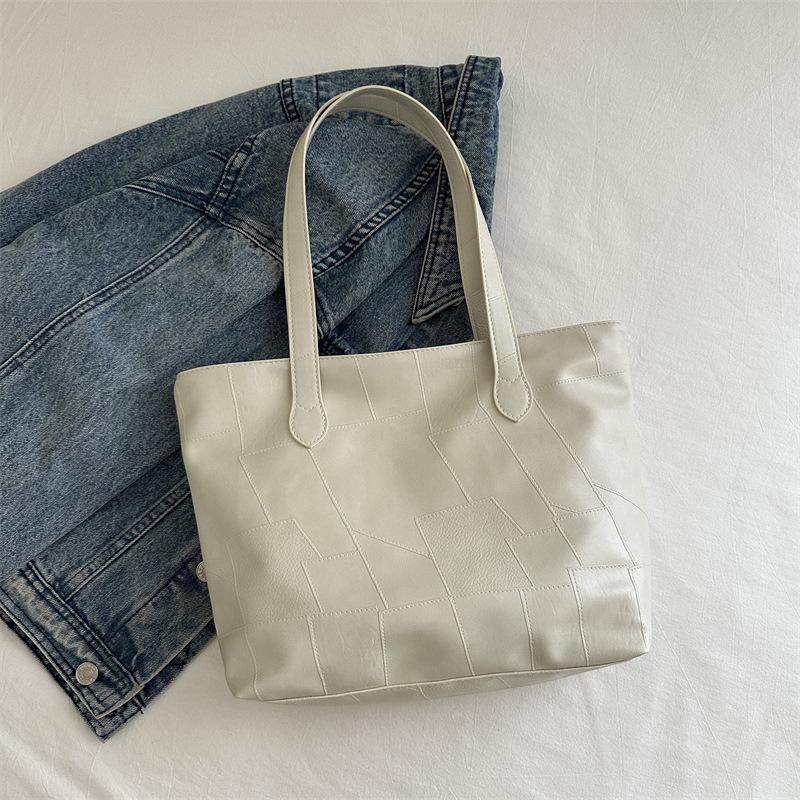 

Мягкая кожаная сумка-шоппер большой вместимости 2025 новая простая сумочка минималистичная лоскутная сумка-тоут женская