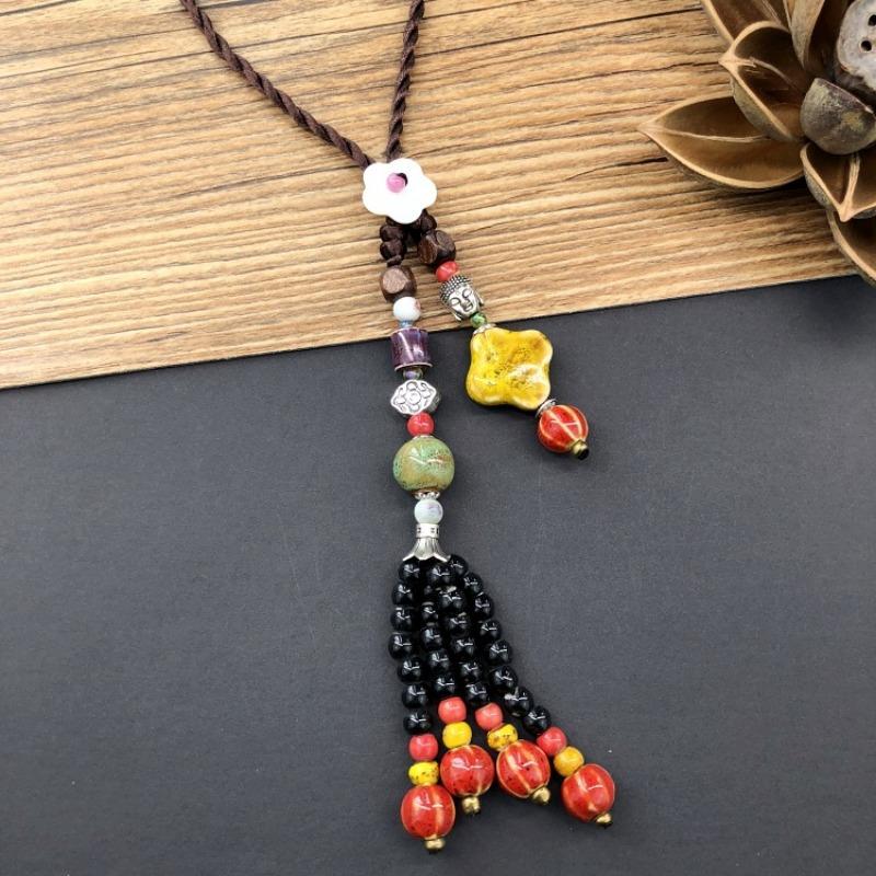 Retro literarische Baumwolle und Leinen Keramikkette, vielseitige lange Pulloverkette für Damen mit Quastenanhänger-Accessoires