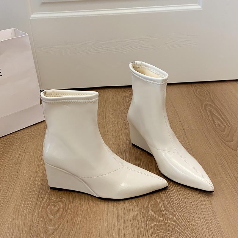 Skinny boots women's boots small short boots women's new temperament autumn and winter slope heel niche fashion heightening French pointed head