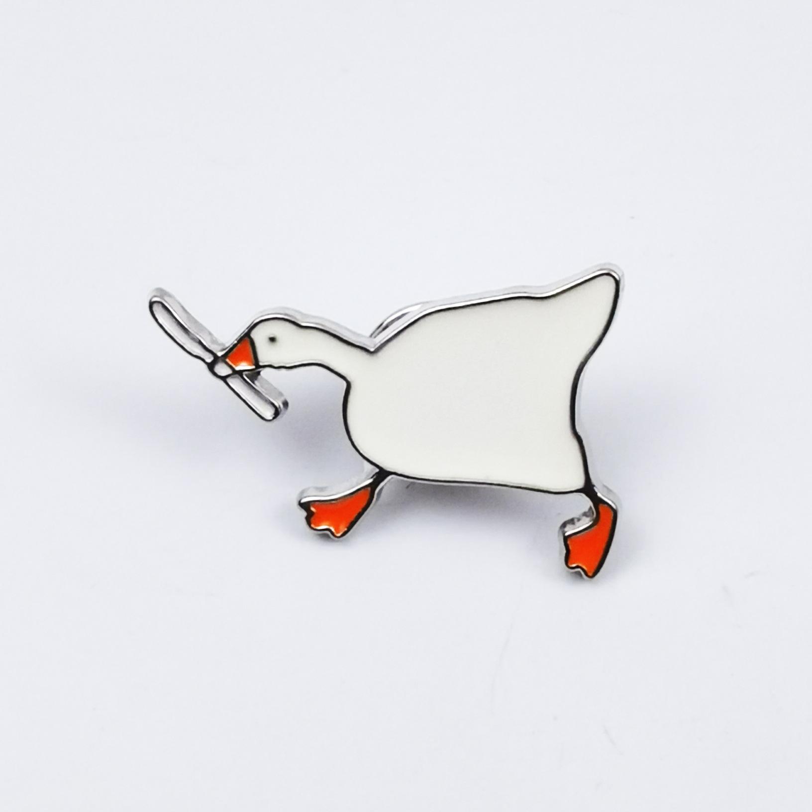 Charming Goose Pose Brooch: Cute Cartoon Animal Metal Badge with Drip Oil Finish.