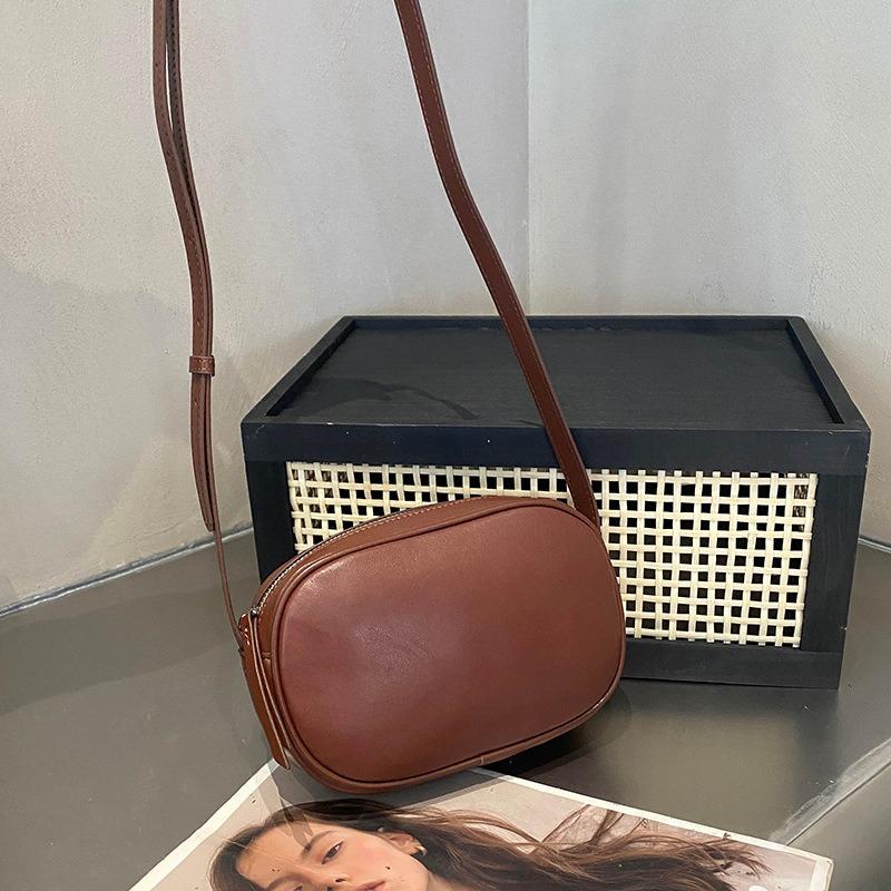 

Niche Design First Layer Cowchmaer Retro Shoulder Маленькая косметичка Маленькая круглая сумка темно-коричневого