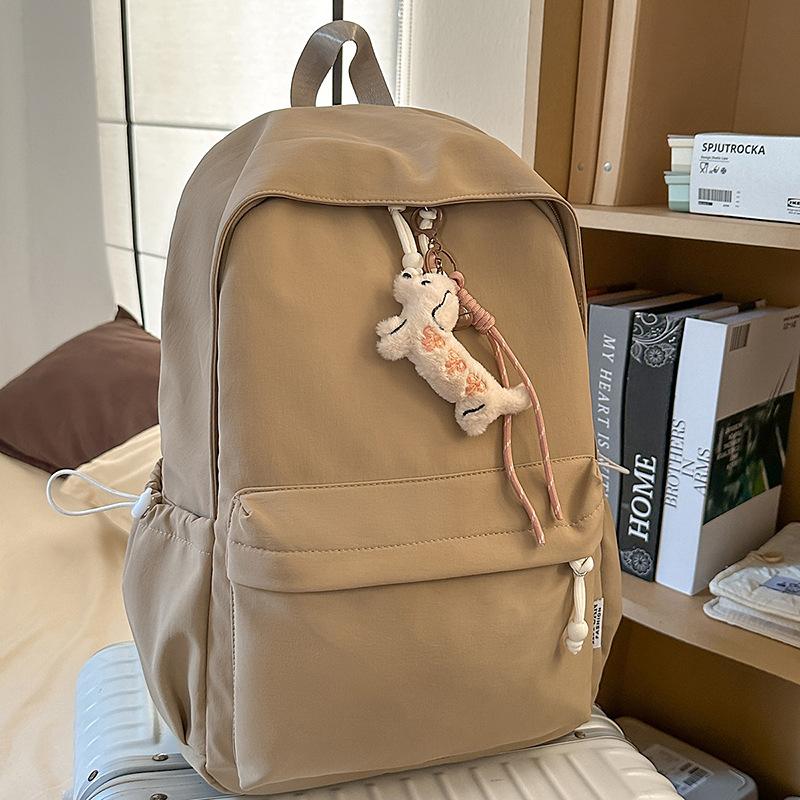 New small fresh schoolbag, high-capacity solid-color backpack for junior high school girls, high-value backpack for primary school students