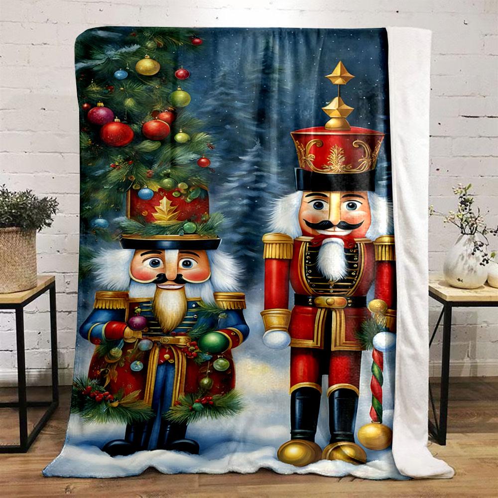 Two Festive Nutcracker Figures, One In Red and One In Blue, In Snowy Scenery. for All Seasons Blanket Lunch Break Throw Gift