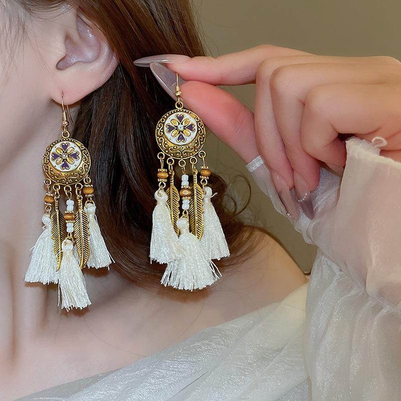 Bohemian ethnic style fringed earrings long niche woven feather earrings new travel wear earrings women