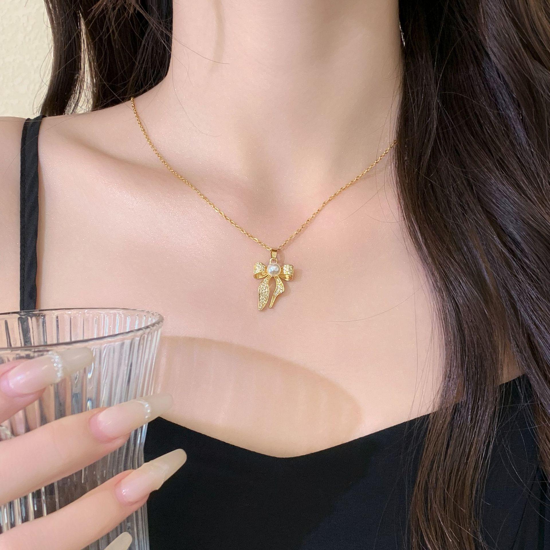 2024 Spring/Summer Women s Bow Pearl Clavicle Necklace - Elegant, Versatile, High-End Design.