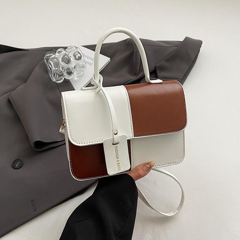 Spring fashion trend high-end sense light luxury shoulder messenger bag contrasting color design sense beautiful temperament handbag women's bag