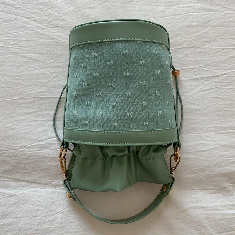 

Bucket bag new niche women s bag cylindrical shoulder bag trendy retro contrasting messenger bag зелений