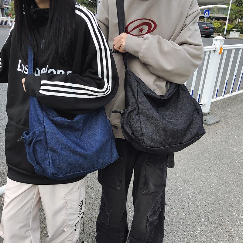 New tote bag fashion shoulder bag men and women the same messenger bag large capacity casual travel bag versatile women's bag tide