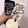 Trendy Mid-Calf Black & White Graffiti Skateboard Socks with Hot-Stamped Cartoon Style Letters