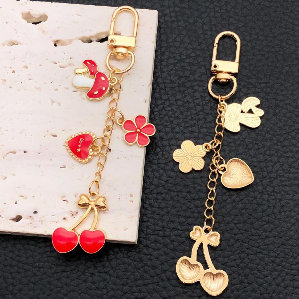 Europäisch-Amerikanischer Stil Roter Pilz Herz Tropföl Schlüsselanhänger Anhänger