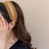 Fascia per capelli intrecciata a tinta unita a tesa larga della celebrità di internet, fascia per capelli bohémien, accessorio per capelli con atmosfera dolce francese