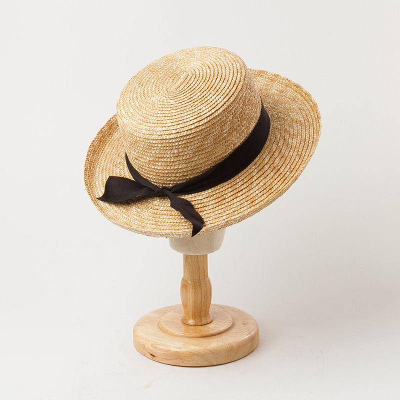 Spring and summer new bow decoration children's wide brim curled straw straw straw hat outdoor travel sun protection straw hat