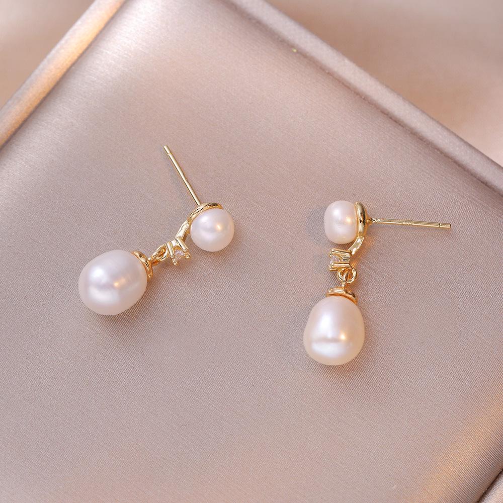 Ohrringe mit Süßwasserperlen-Quasten in Silber für Damen - Modisch, originell und elegant für den täglichen Gebrauch.