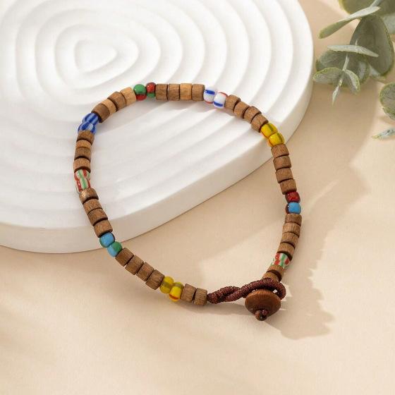 

Versatile classic camouflage wood grain rice bead bracelet fashionable wood texture color ethnic hand jewelry темно-коричневого кольору