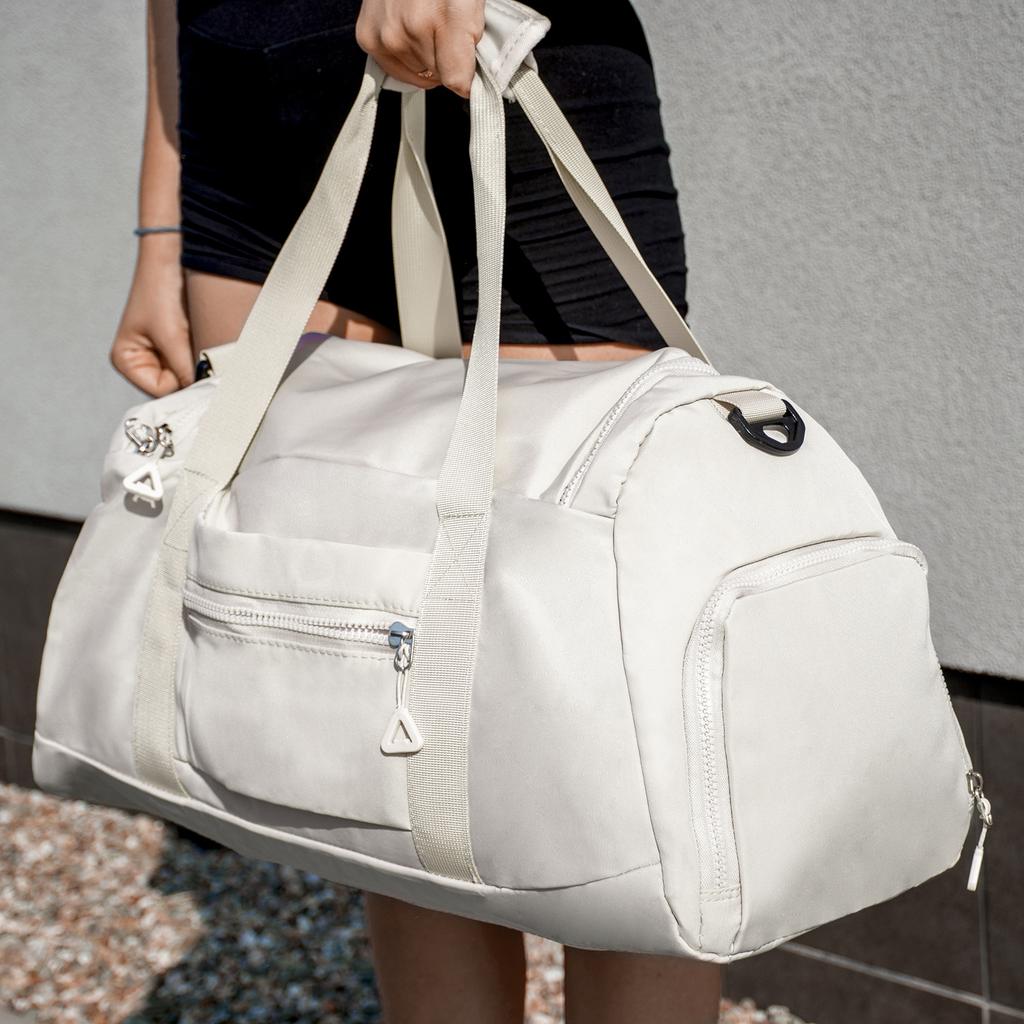 Large ecru sports travel training bag, hand luggage, tourist bag