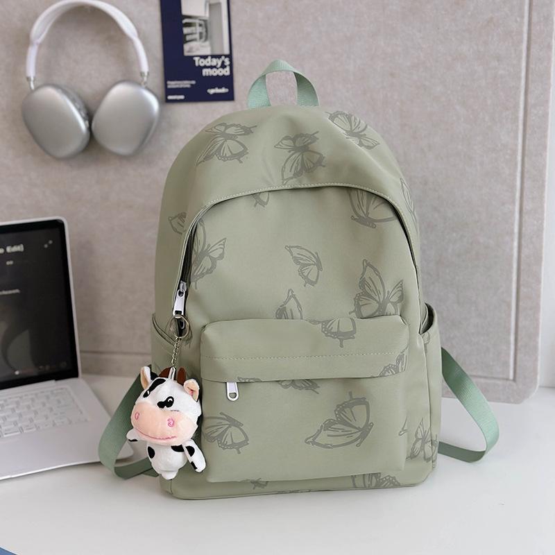 High-value reflective butterfly backpack, new junior high school girl high school student schoolbag ins niche travel backpack