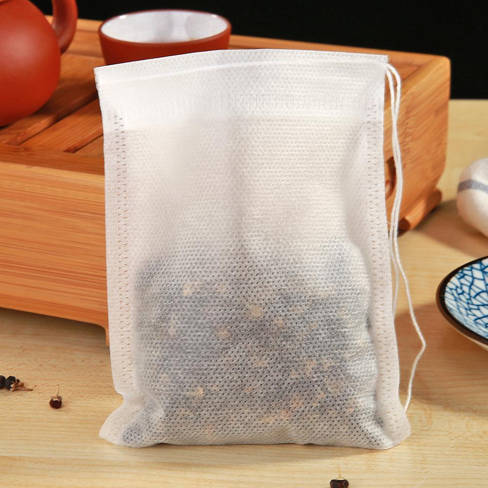 50pcs Non-Woven Drawstring Tea Bag Seal Filter Pouch Tool Herb Spice Supply #8Y 50pcs Non-Woven Drawstring Tea Bag Seal Filter Pouch Tool Herb Spice Supply #8Y