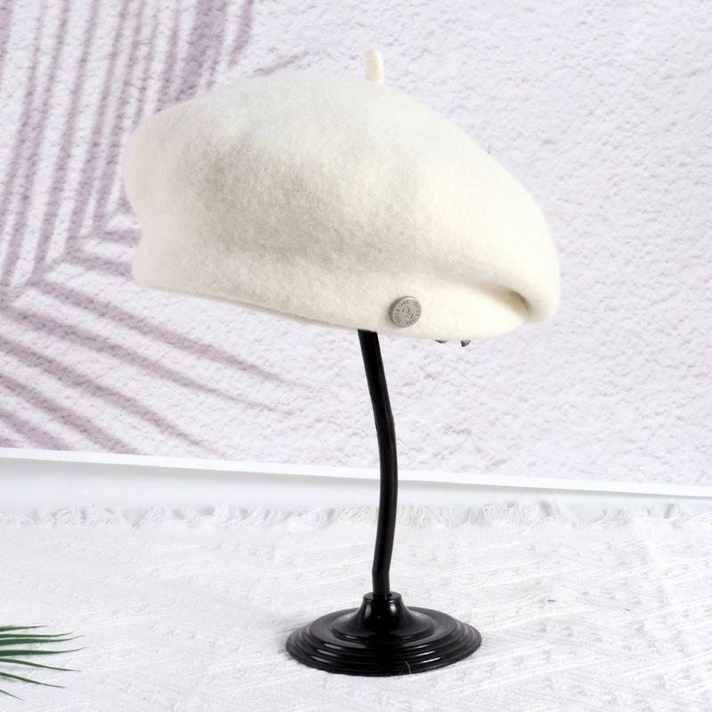 Autumn and winter beret small round label temperament wool hat female face small high quality elegant warm painter hat light luxury