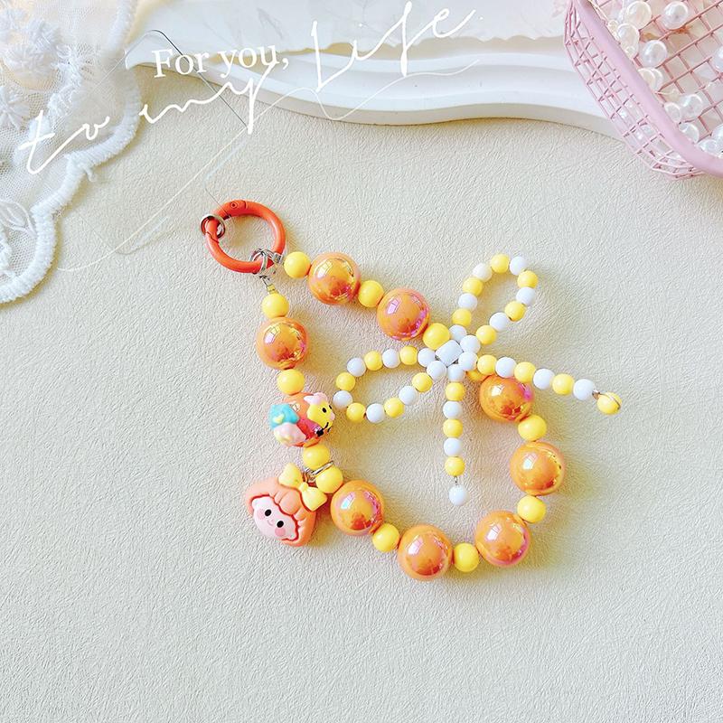 

Милый брелок для телефона с бисером и бантом, милая девушка, ремешок на запястье, браслет, чехол для наушников, подвеска, декор для сумки оранжевый