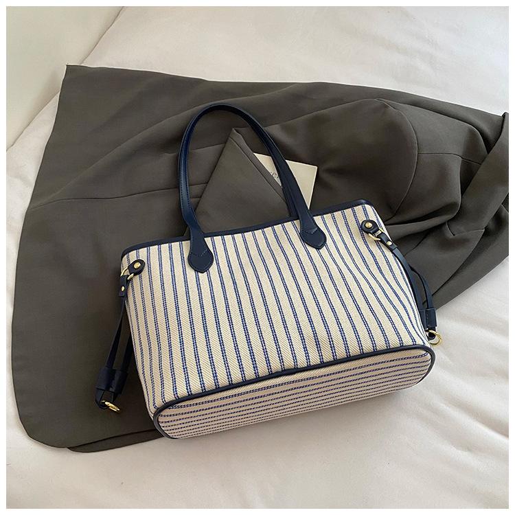 

2025 new striped contrasting color tote bag female senmeng niche casual fashion handbag versatile underarm bag