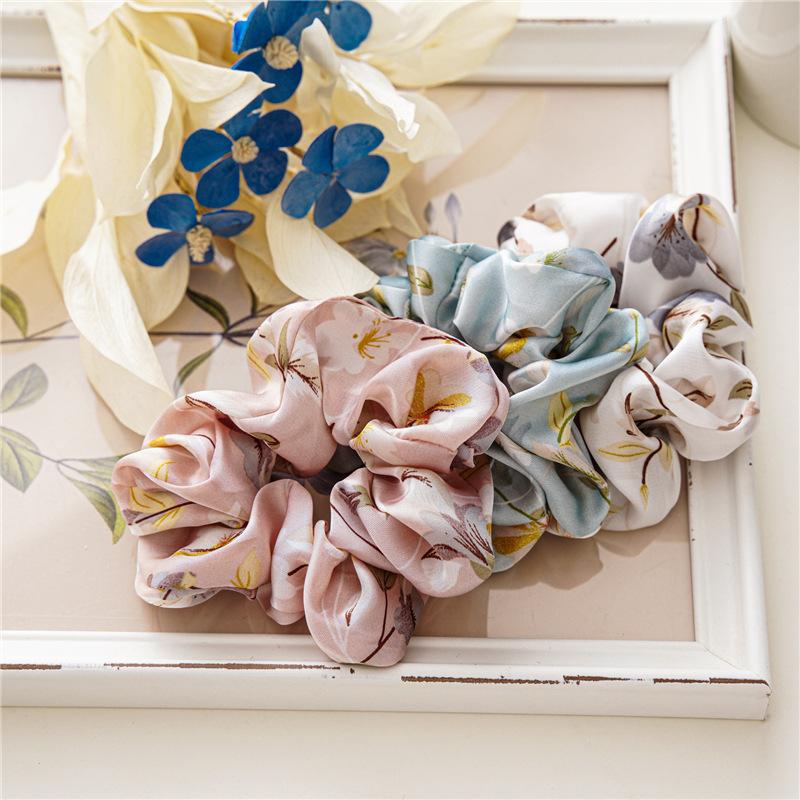 French-style smooth satin scrunchie with floral pattern, versatile elastic hair tie for women, popular on Instagram