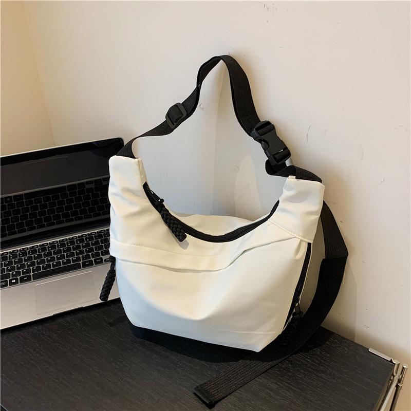 Bolsa de ombro casual simples de nylon para mulheres com zíper sólido, novo estilo de bolsa de ombro, grande capacidade, moda versátil