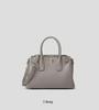 Chic Women's Tote Bag: Niche Design, Hand-Held Platinum, Large-Capacity, Fashionable Messenger Bag.