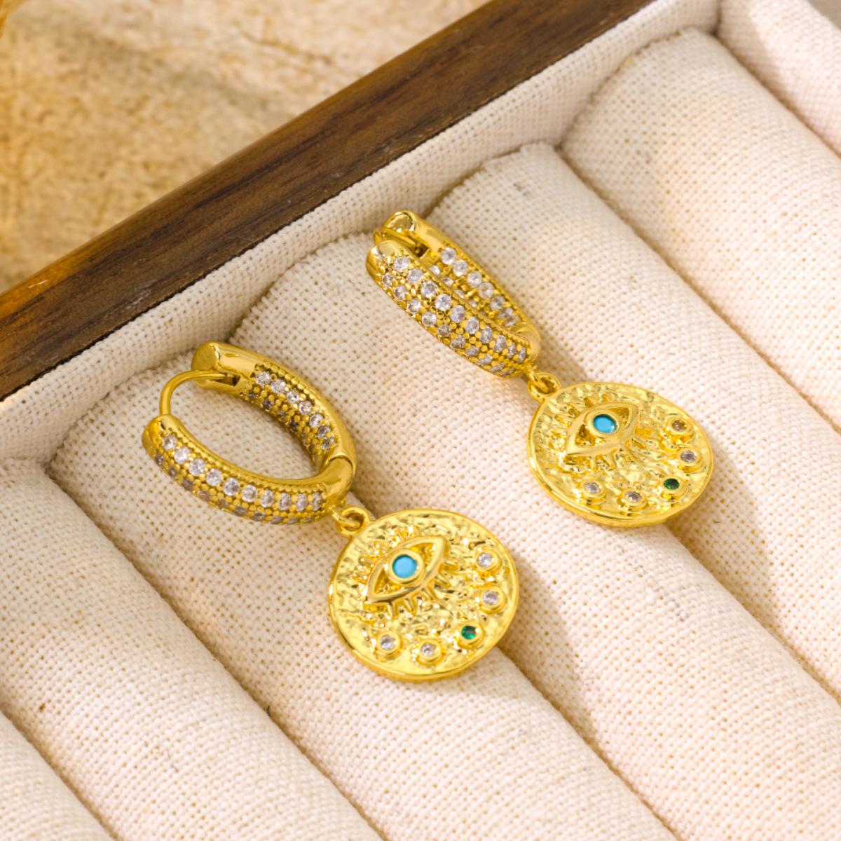 Yaoquan Cross Border New Product Micro Inlaid Zircon Copper Plated 18K Gold Devil s Eye Earrings Niche Light Luxury Buckle